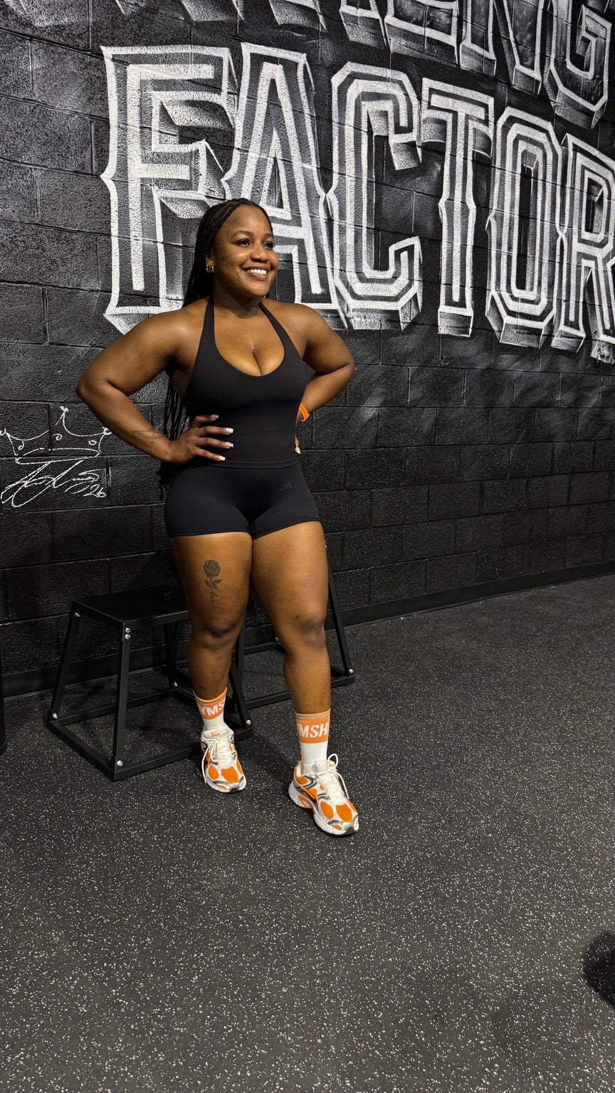 Full-body fit of the black Pressure Short and Quiet Bra in the gym