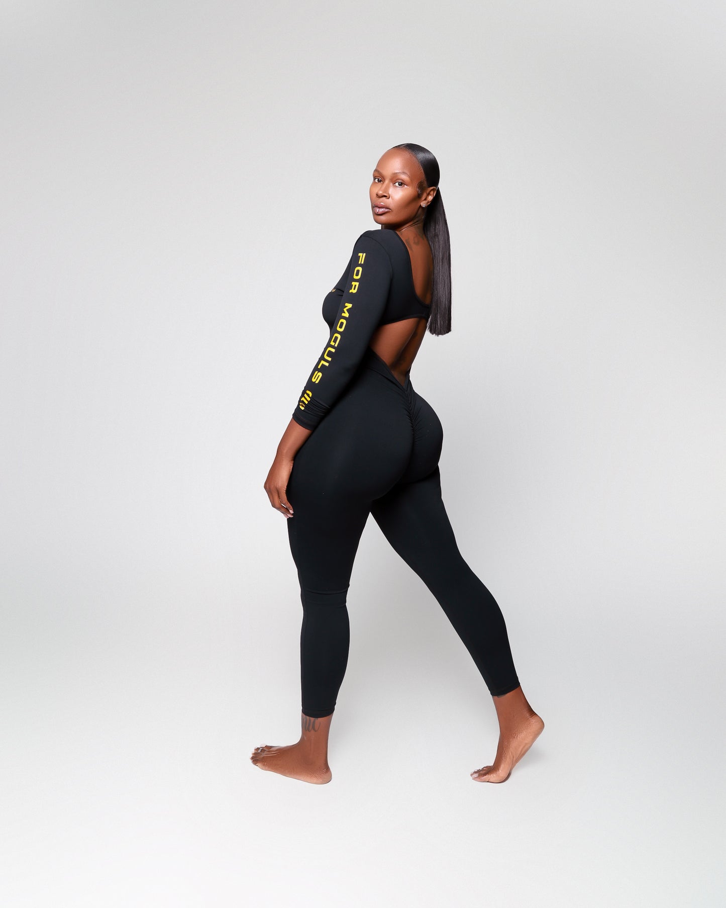 Foundation Coaching by For Moguls Only featuring female athlete in FMO performance apparel. Foundational fitness coaching, personalized workouts, nutrition guidance, accountability, and sustainable lifestyle transformation.