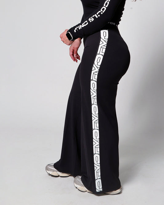 Woman's black flared leggings with signature print by FMO Brand
